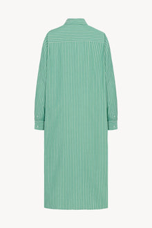 The image displays the back view of a long-sleeved midi dress. It is a button-down style, crafted from green and white cotton. The dress is presented on a plain white background.