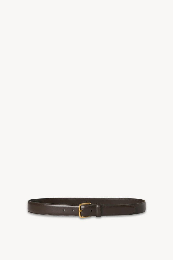 Front view of dark brown classic belt on white background, with no model shown.