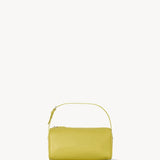 Front view of coppery yellow leather bag on white background, with no model shown.