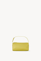 Front view of coppery yellow leather bag on white background, with no model shown.