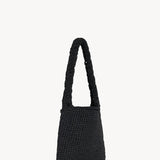 Front slanted view of black Didion Shoulder bag on white background, with no model shwon.
