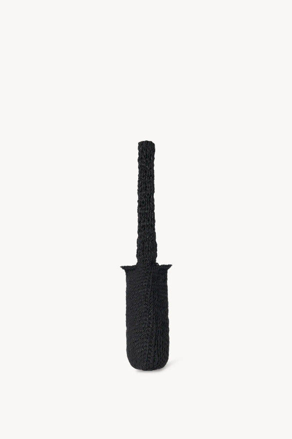 Side view of black Didion Shoulder bag on white background with no model shown.