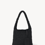 Back view of black Didion Shoulder bag on white background with no model shown.