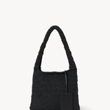 Back view of black Didion Shoulder bag on white background with no model shown.