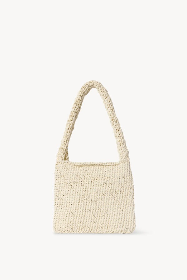 Front view of ivory didion shoulder bag on white background with no model shown.