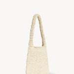 Front slanted view of ivory didion shoulder bag on white background, with no model shown.