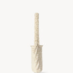 Side view of ivory didion shoulder bag on white background, with no model shown.
