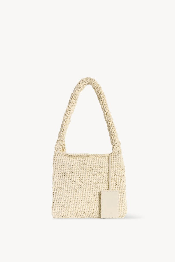Front view of ivory didion shoulder bag on white background, with no model shown.