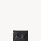 Front view of black envelope clutch on white background, with no model shown.