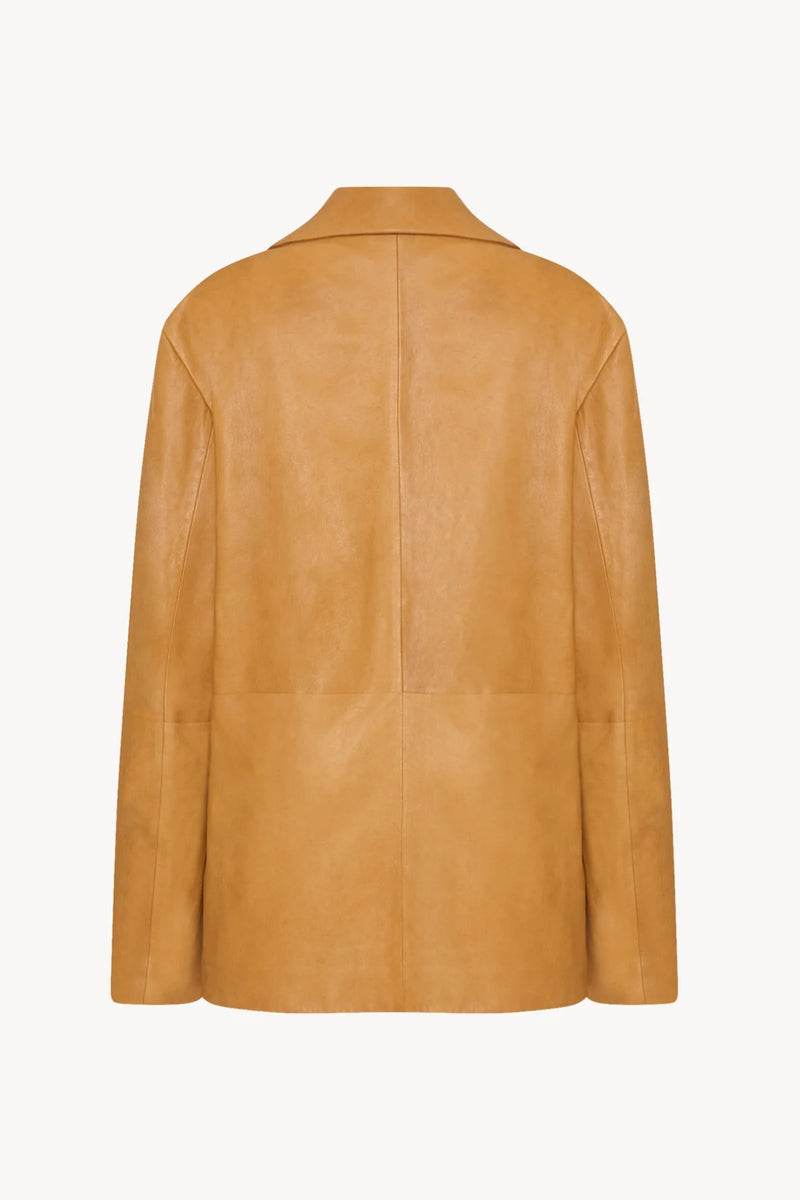 A caramel colored lambskin leather jacket, shown back facing without model.