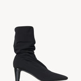 Right side view of black felice stretch boot on white background, with no model shown.