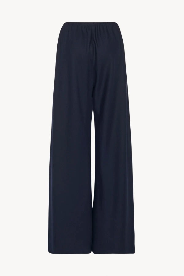 Back view of navy gala pant on white background, with no model shown.