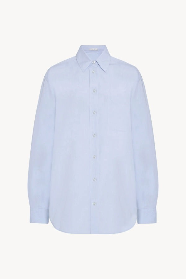 Front view of sky blue gavina shirt on white background, with no model shown.