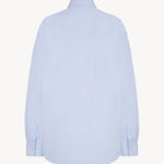 Back view of sky blue gavina shirt on white background, with no model shown.