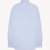 Back view of sky blue gavina shirt on white background, with no model shown.