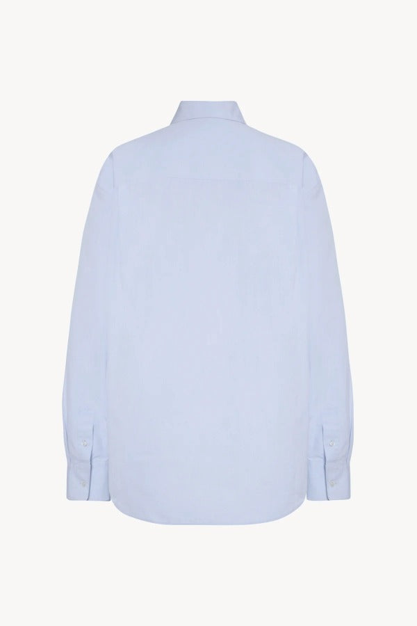 Back view of sky blue gavina shirt on white background, with no model shown.