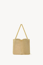 Side view of gold mesh bag on white background, with no model shown.