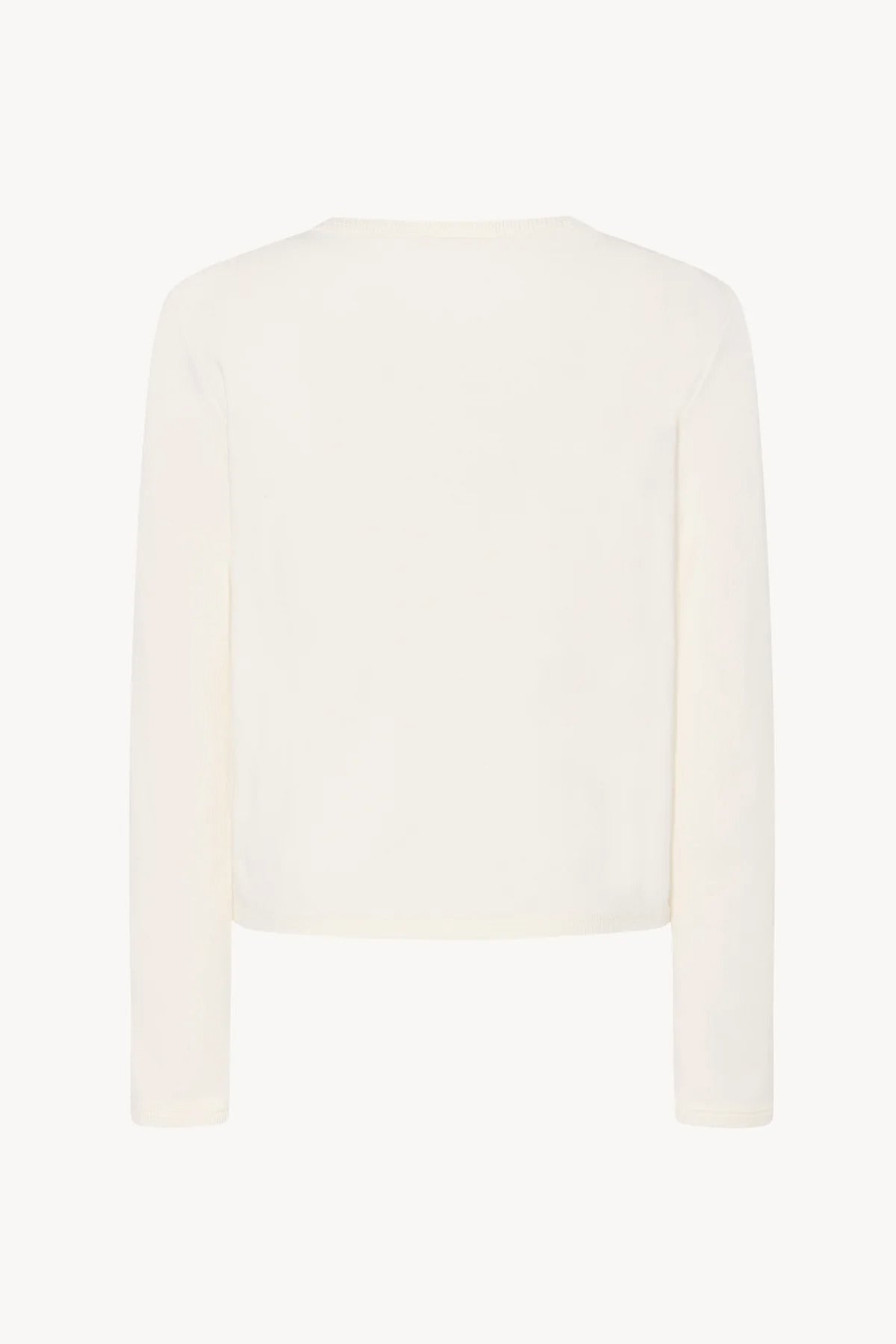 A long-sleeved white cotton button-down sweater is displayed from the back against a plain white background, without a model.