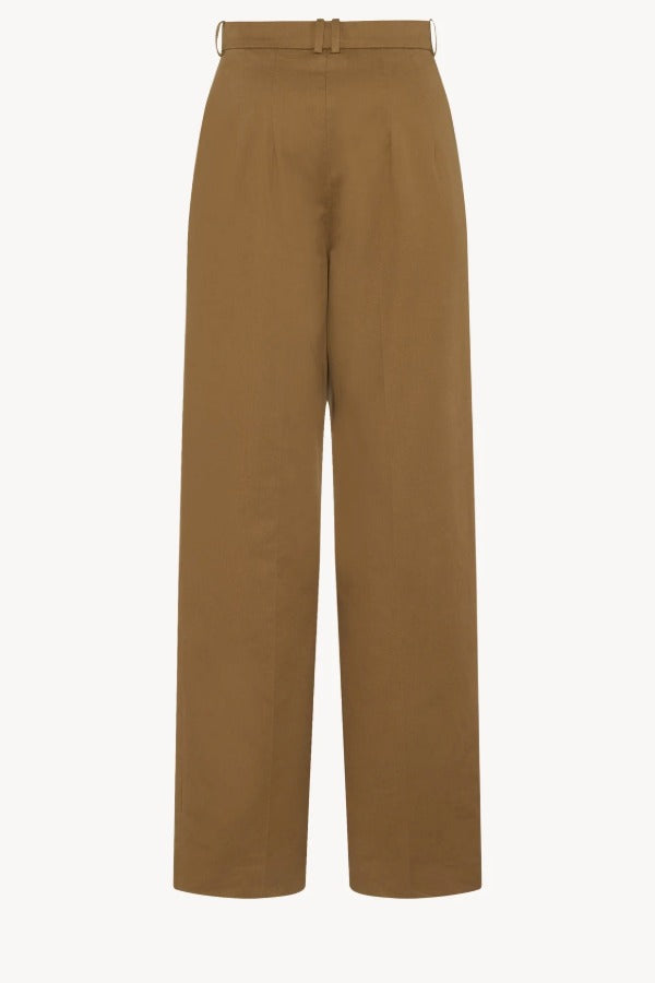 Back view of dark sand igor pant on white background, with no model shown.