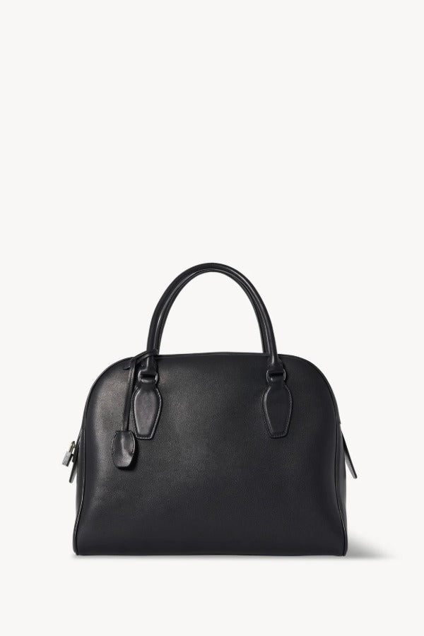 Front view of black India 12 bag on white background, with no model shown.