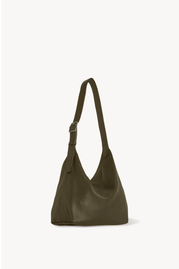 Back view of military olive isa shoulder bag on white background, with no model shown.