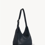 Front slanted view of blu notte isa shoulder bag on white background, with no model shown.