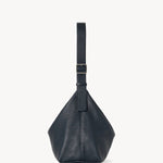 Side view of blu notte isa shoulder bag on white background, with no model shown.