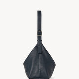 Side view of blu notte isa shoulder bag on white background, with no model shown.