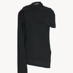 Front view of black isadra top on white background, with no model shown.