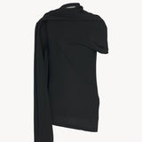 Front view of black isadra top on white background, with no model shown.