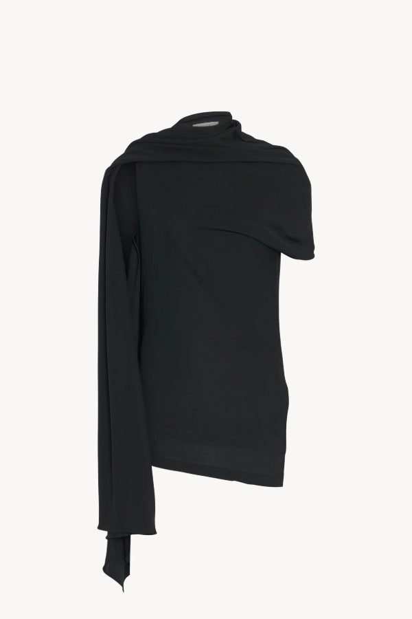 Front view of black isadra top on white background, with no model shown.