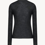 Back view of black iverness top on white background, with no model shown.
