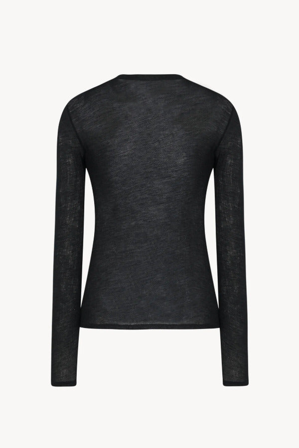 Back view of black iverness top on white background, with no model shown.