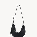 Front view of black jouvette bag on white background, with no model shown.