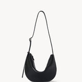 Front view of black jouvette bag on white background, with no model shown.