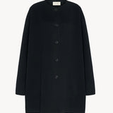 Front view of black kala coat on white background, with no model shown.
