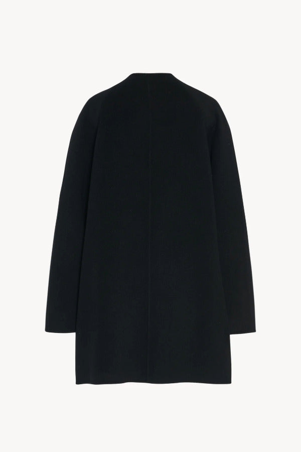 Back view of black kala coat on white background, with no model shown.