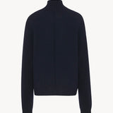 Back view of dark navy kensington top on white background, with no model shown.