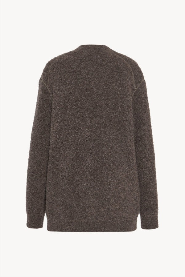 Back view of taupe laleh cardigan on white background, with no model shown.
