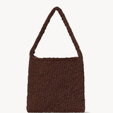 Front view of brown large didion bag on white background, with no model shown.