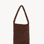Front slanted view of brown large didion bag on white background, with no model shown.