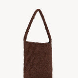 Front slanted view of brown large didion bag on white background, with no model shown.