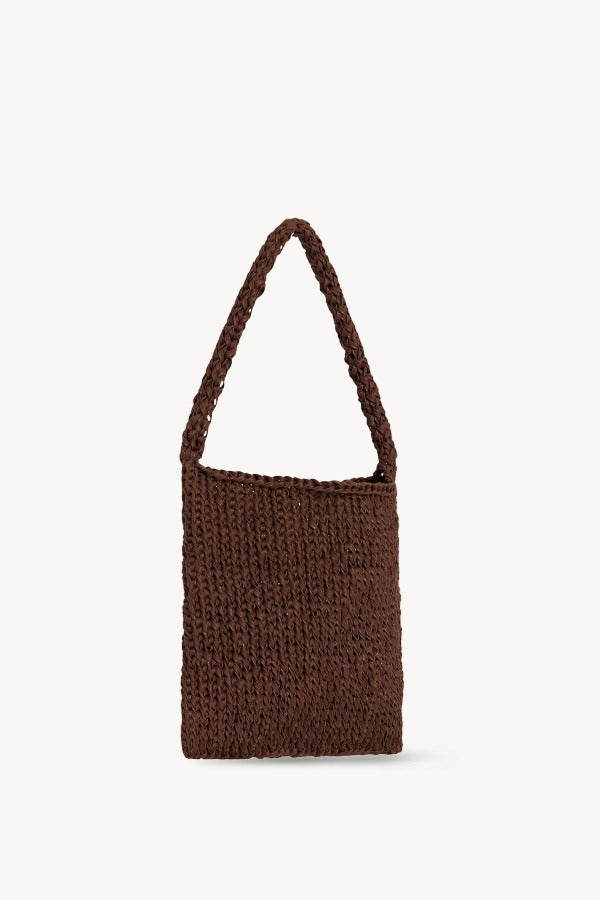 Front slanted view of brown large didion bag on white background, with no model shown.