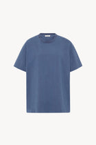 A light blue cotton T-Shirt is pictured against a white backdrop, shown without model