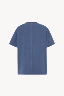 A light blue cotton T-Shirt is shown at a backside viewpoint against white backdrop, shown with no model