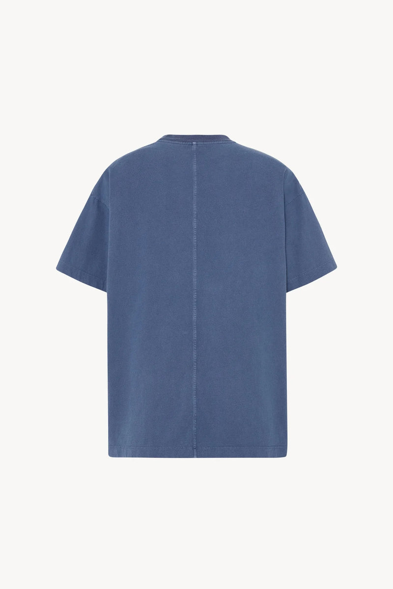 A light blue cotton T-Shirt is shown at a backside viewpoint against white backdrop, shown with no model
