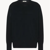 Front view of black leilani top on white background, with no model shown.