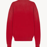 Back view of red leora sweatshirt on white background, with no model shown.