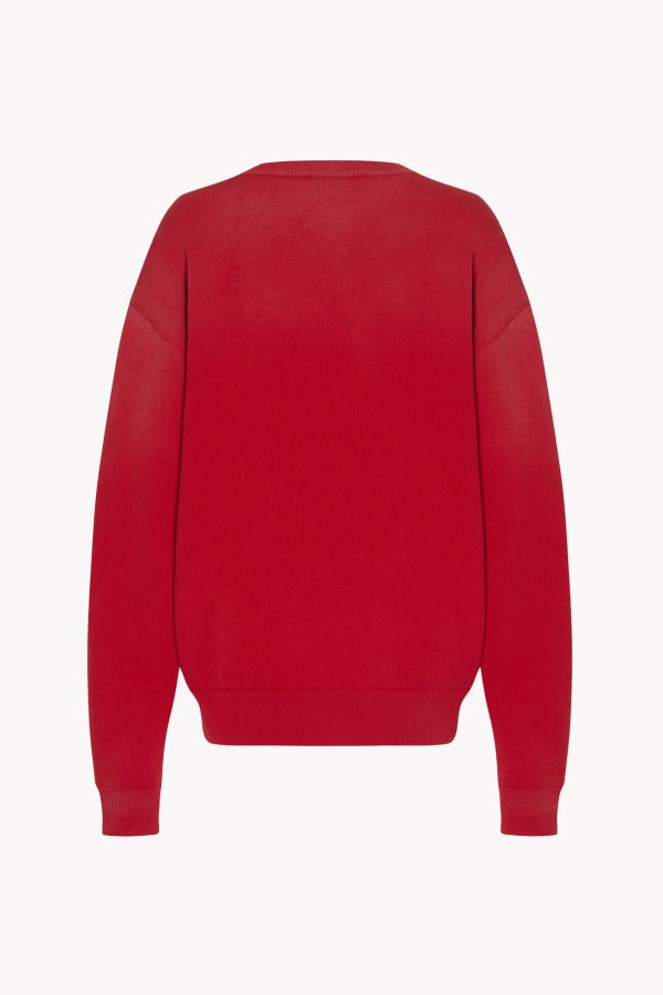 Back view of red leora sweatshirt on white background, with no model shown.