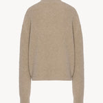 Back view of beige lethara sweater on white background, with no model shown.